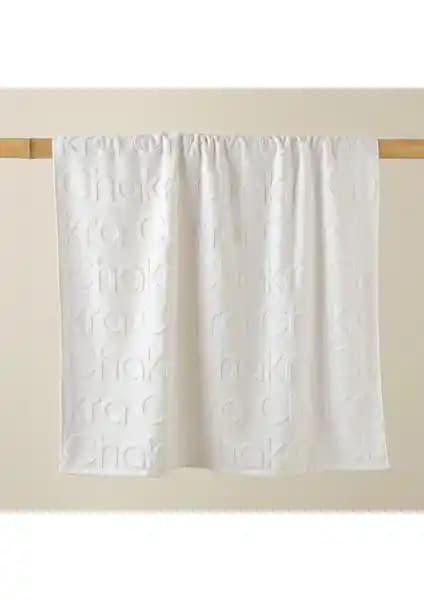 Chakra Logolu Beyaz Plaj Havlusu: Şık ve Konforlu Tatil Keyfi İçin Ideal Seçenek